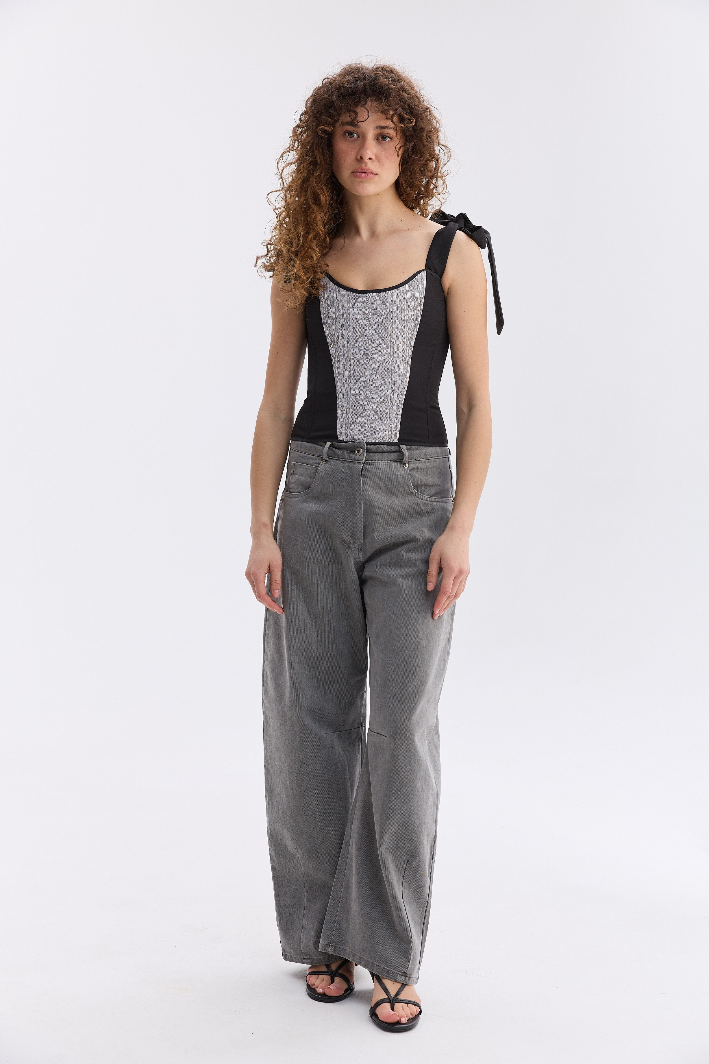 Орнаментований жіночий топ зі шнурівкою