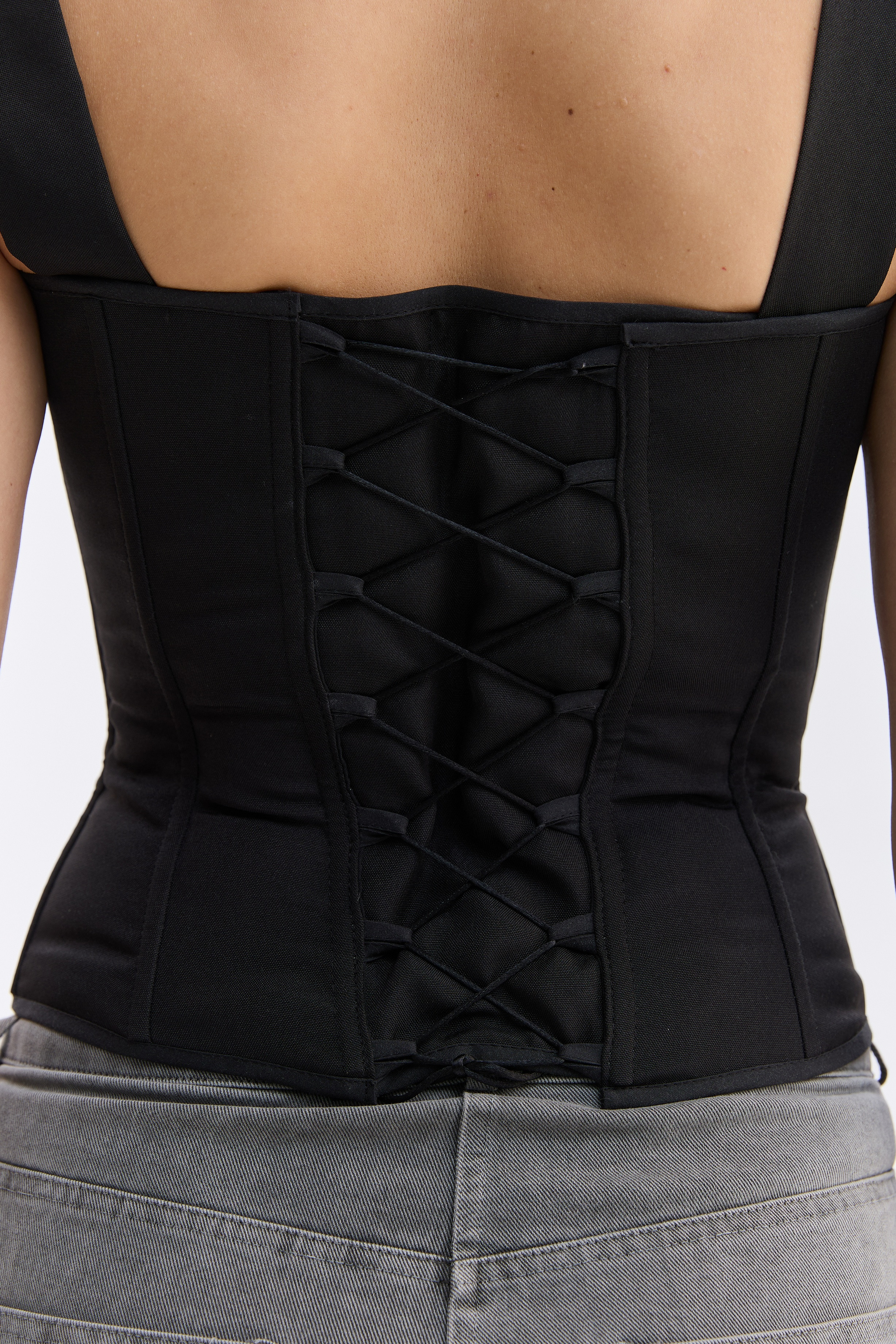 Орнаментований жіночий топ зі шнурівкою