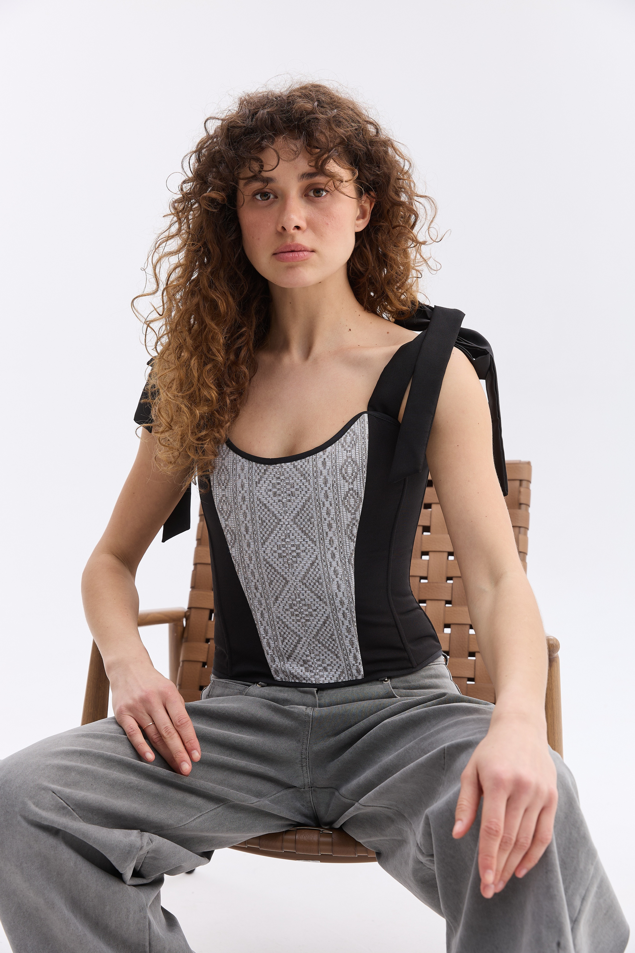 Орнаментований жіночий топ зі шнурівкою