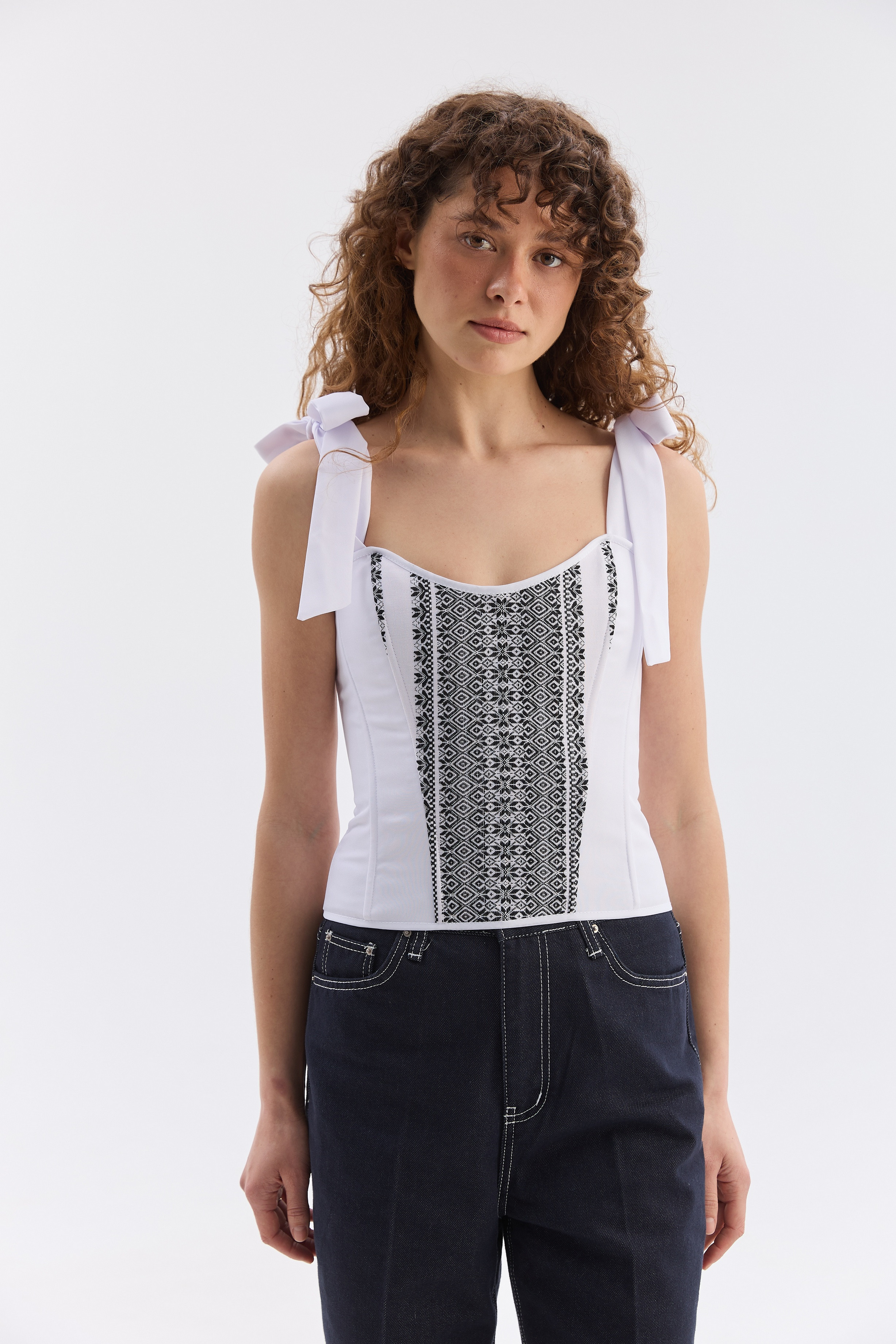 Орнаментований жіночий топ зі шнурівкою
