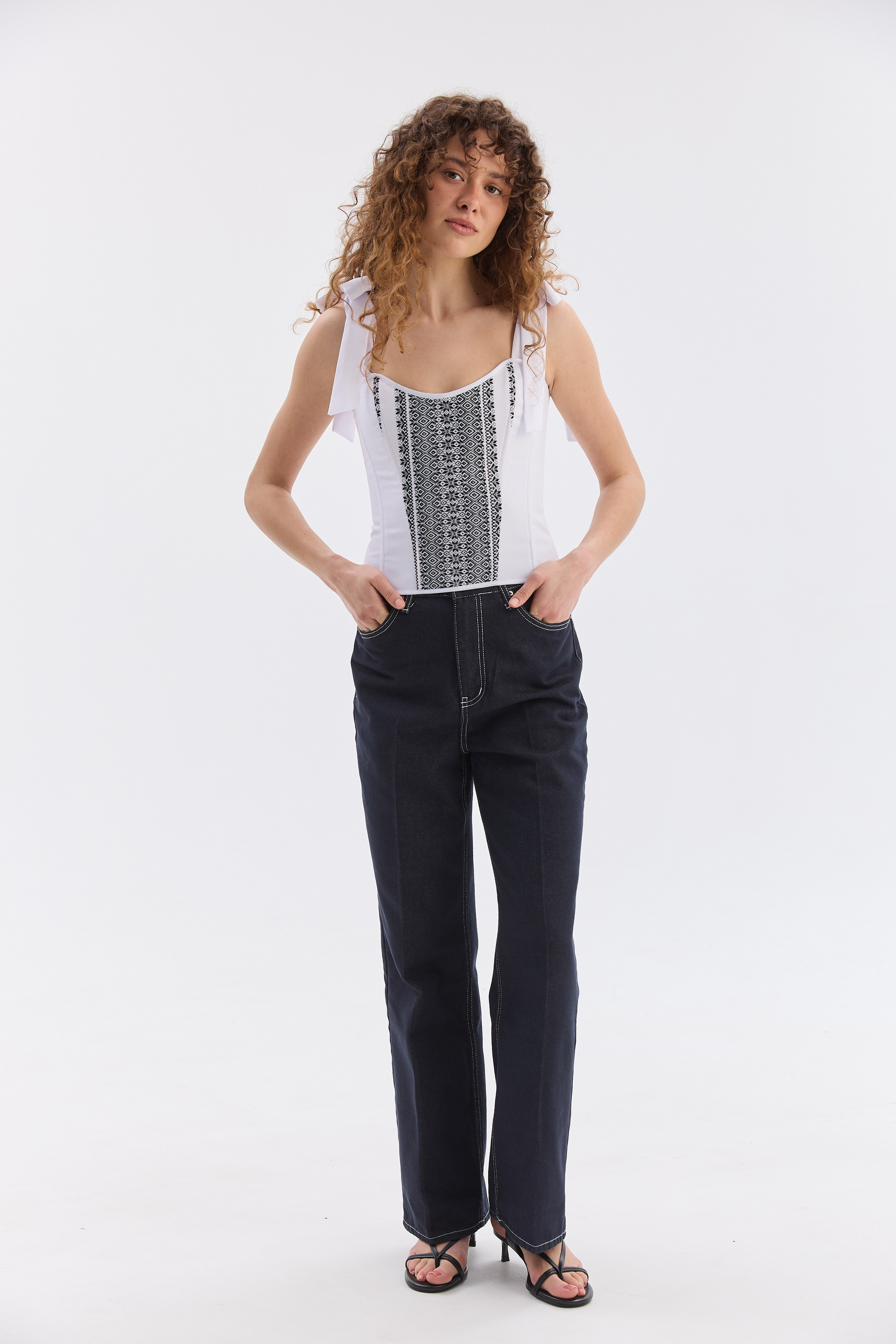 Орнаментований жіночий топ зі шнурівкою